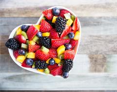Heart-shaped bowl of mixed berries