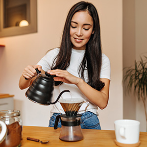 Preparing pour-over coffee at home